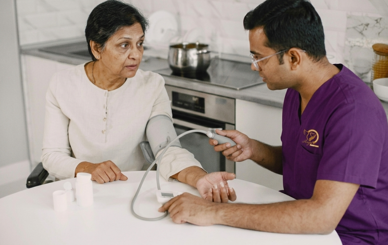 Professional allied healthcare specialist assisting patient at home in Trivandrum