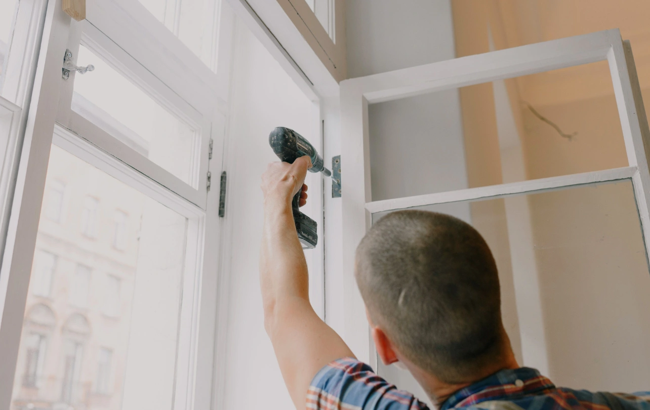 Technician conducting preventive maintenance inspection in a residential home