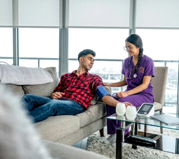 nurse providing patient care at home