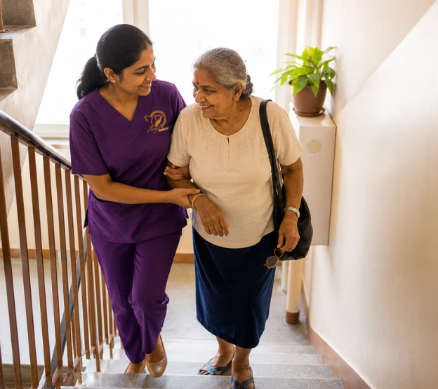 Healthcare professional assisting senior citizen with mobility support at home