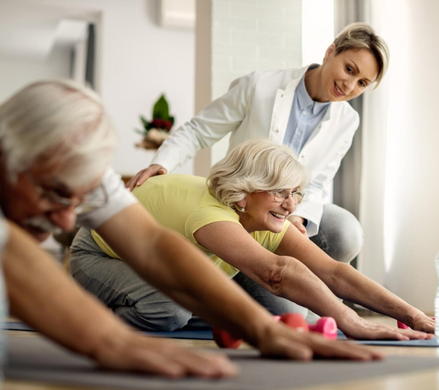 Elderly patient doing physiotherapy exercises