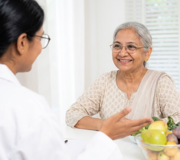 Healthcare nutrition expert supporting elderly patient with dietary guidance