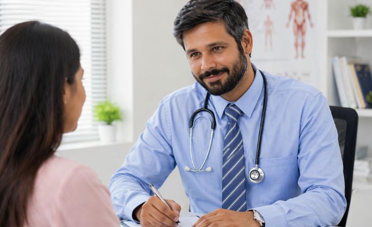 Doctor visiting elderly patient at home in Trivandrum